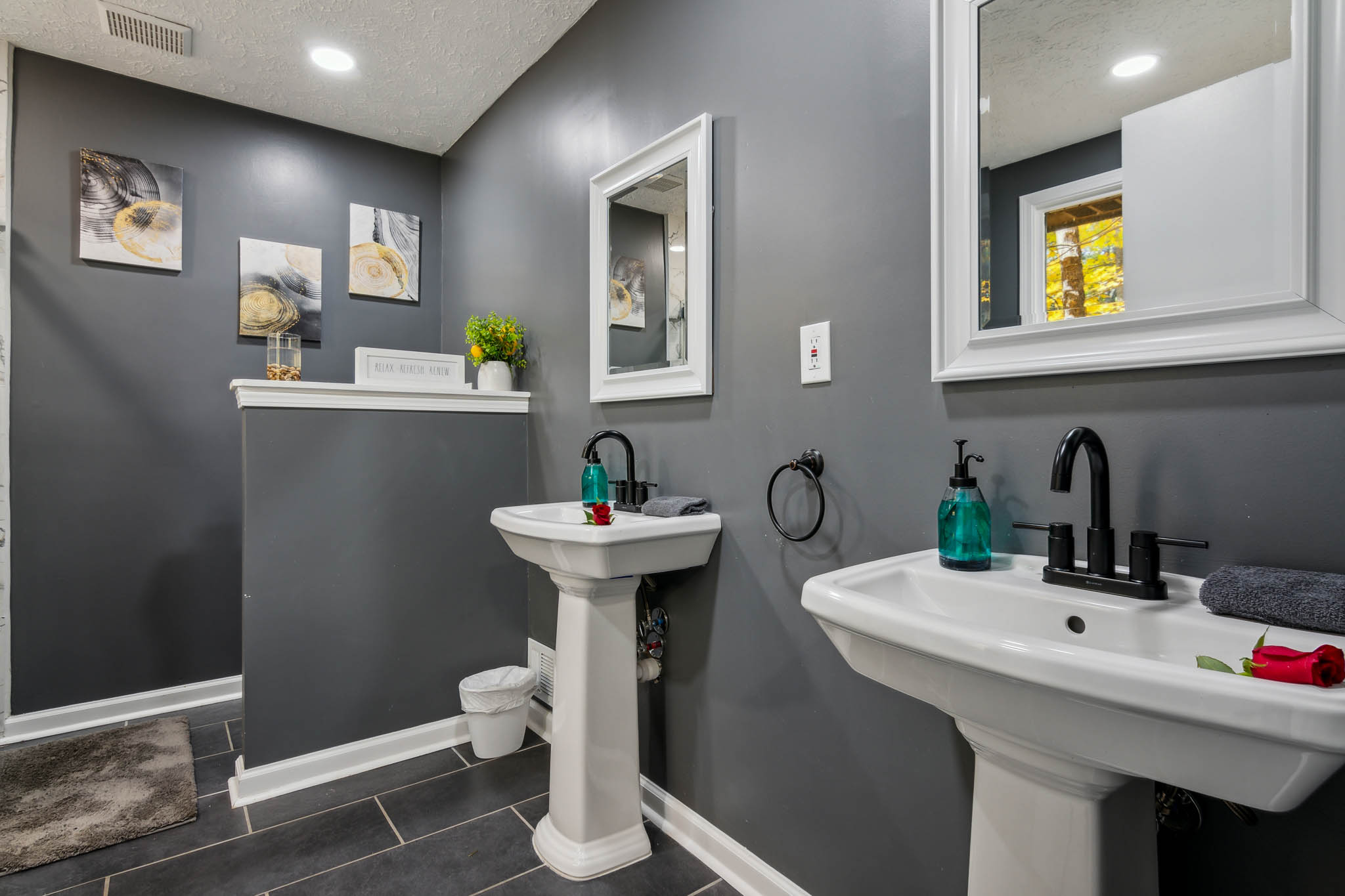 Modern dual-sink bathroom, The Retreat at Douglasville