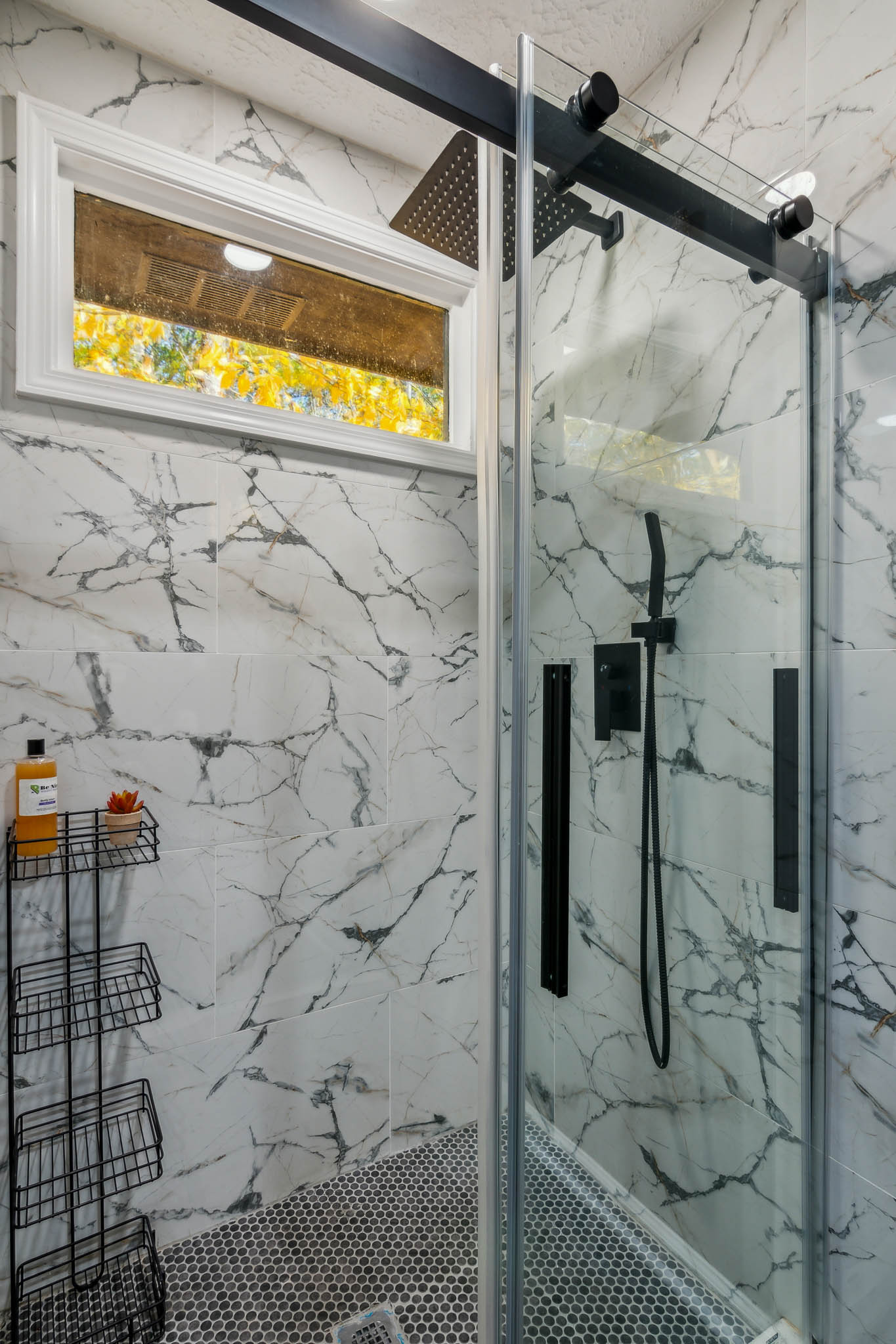 Walk-in shower with marble finish, The Retreat at Douglasville