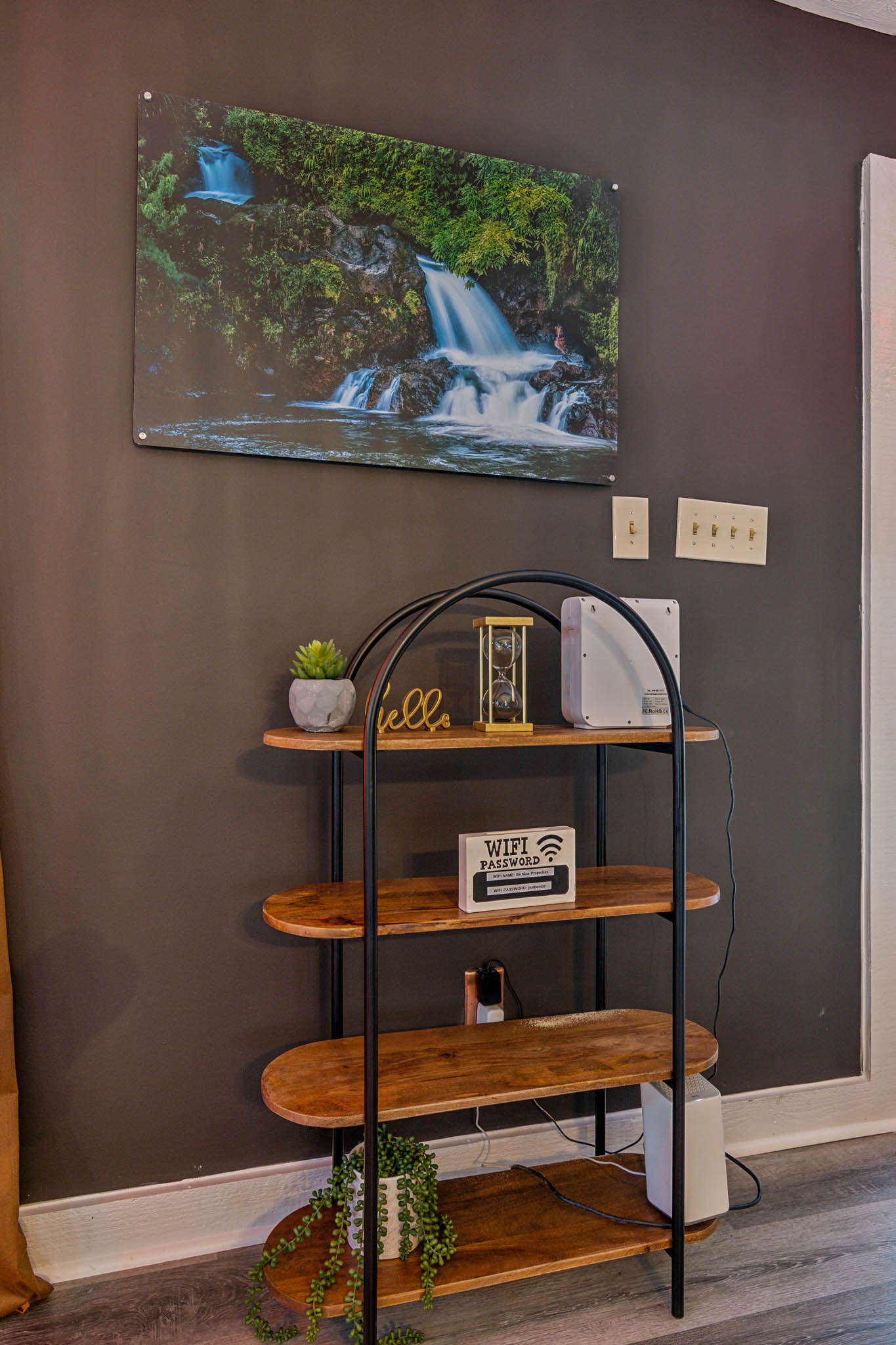 Indoor spa with hot tub and neon sign, The Retreat at Douglasville